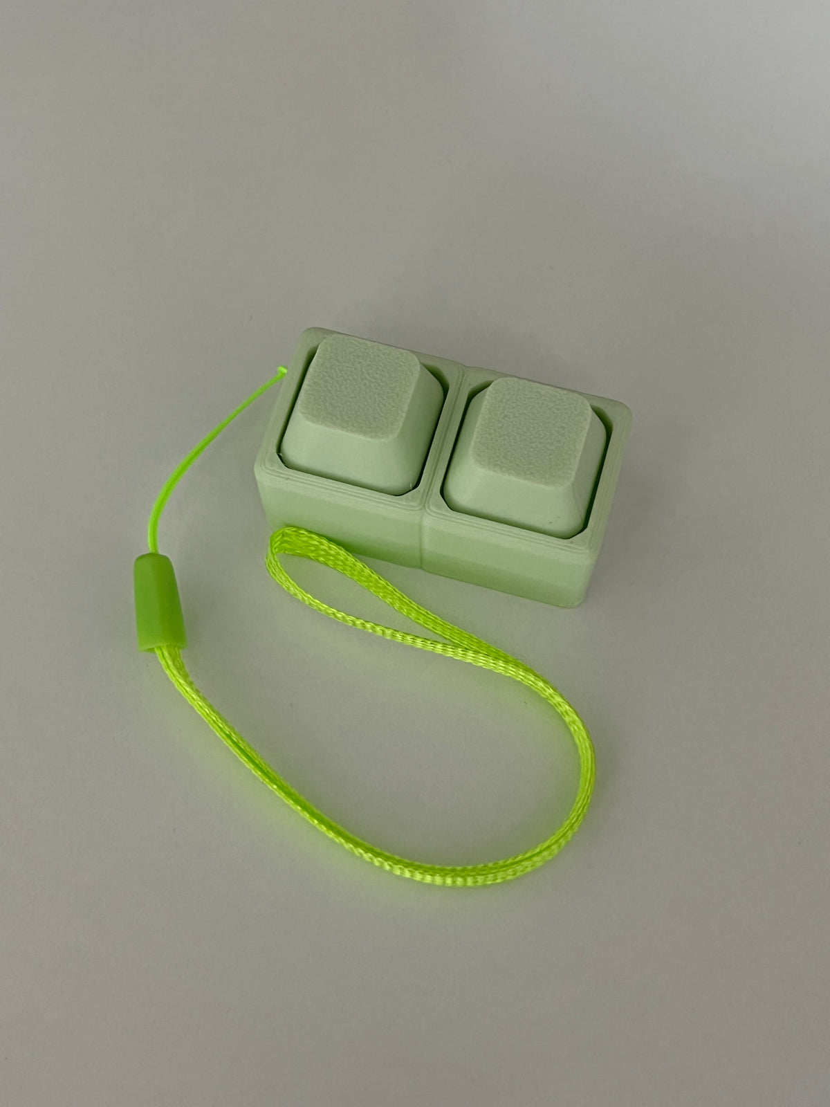 Mini Clicker Antistress 3D con Laccetto – Portachiavi Fidget a Due Tasti
