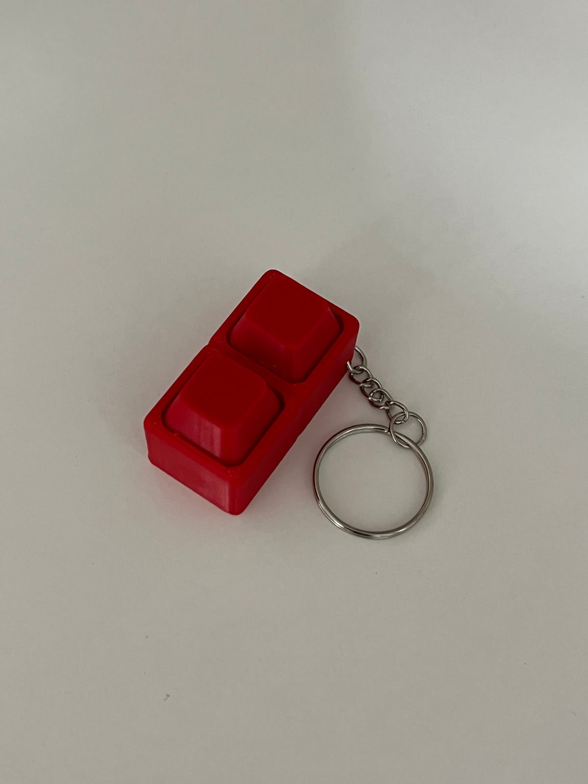 Mini Clicker Antistress 3D con Laccetto – Portachiavi Fidget a Due Tasti